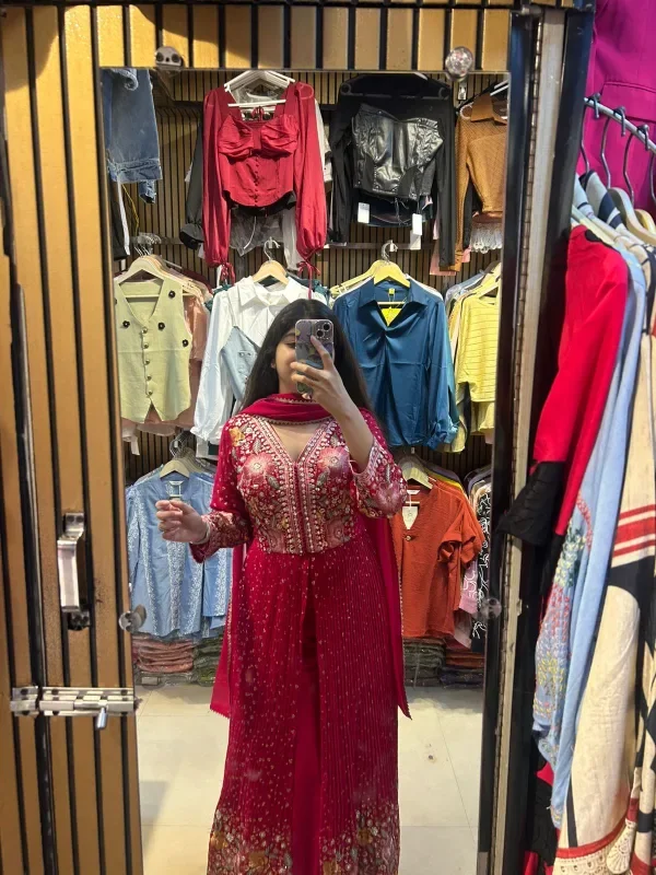 A Glimpse of a Beautifully Embellished Pink Outfit - Image 3