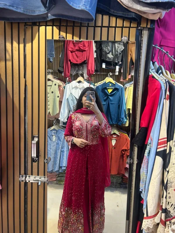 A Glimpse of a Beautifully Embellished Pink Outfit - Image 4