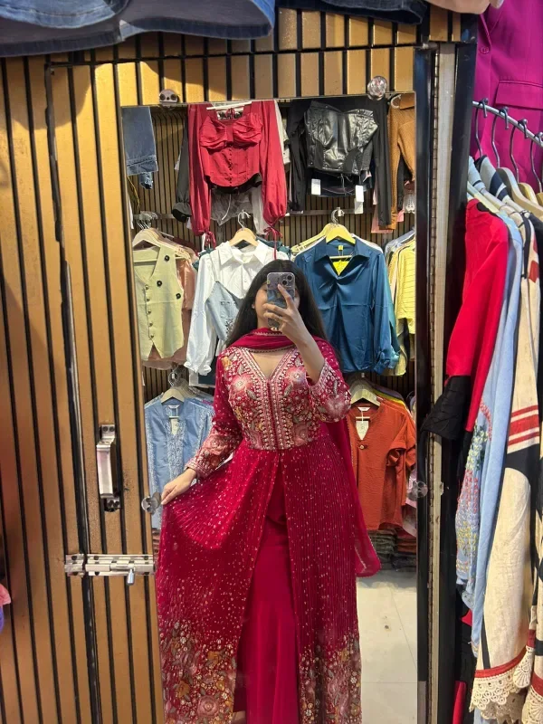 A Glimpse of a Beautifully Embellished Pink Outfit - Image 5