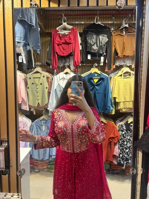 A Glimpse of a Beautifully Embellished Pink Outfit - Image 8